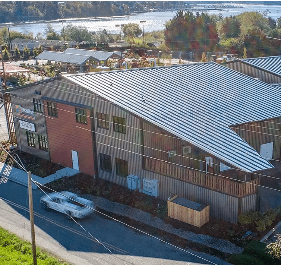 Industrial building near scenic river view