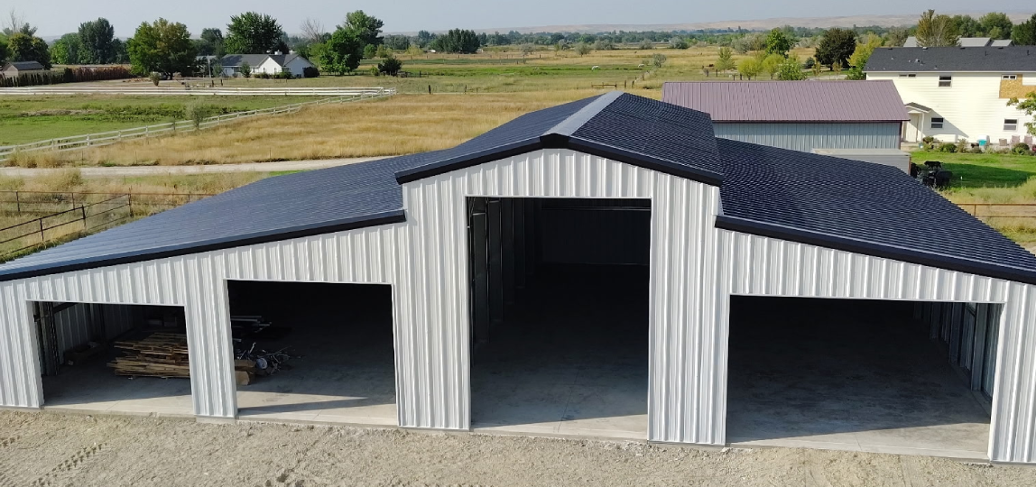 Large steel barn in rural area