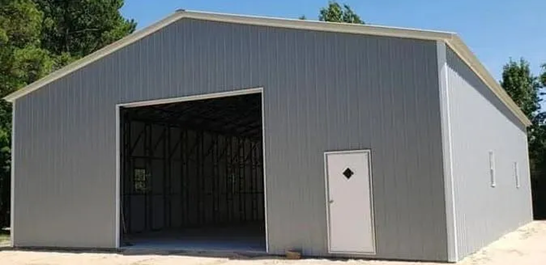 Steel building exterior with side door